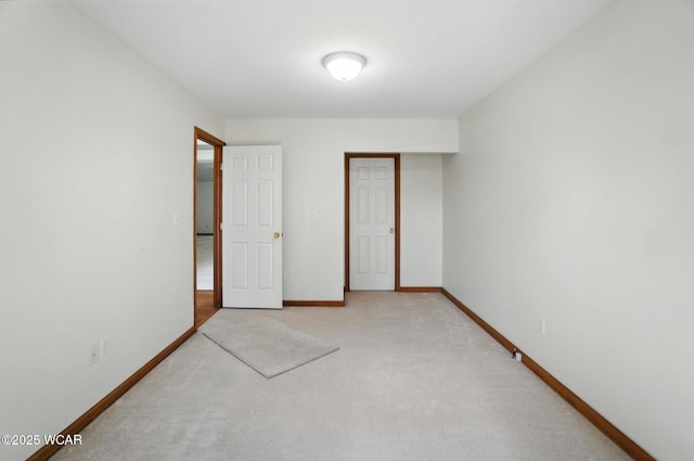 556 Westerly Dr, Lima, OH 45805 - unfurnished bedroom with light colored carpet and a closet