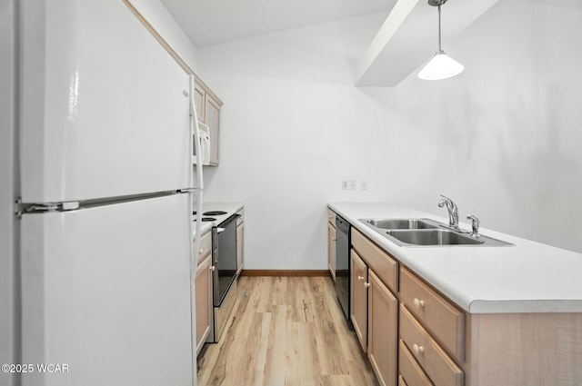 556 Westerly Dr, Lima, OH 45805 - kitchen featuring white appliances, light wood-style flooring, vaulted ceiling, a peninsula, and light countertops