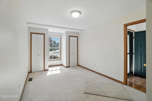 556 Westerly Dr, Lima, OH 45805 - entryway featuring baseboards and carpet