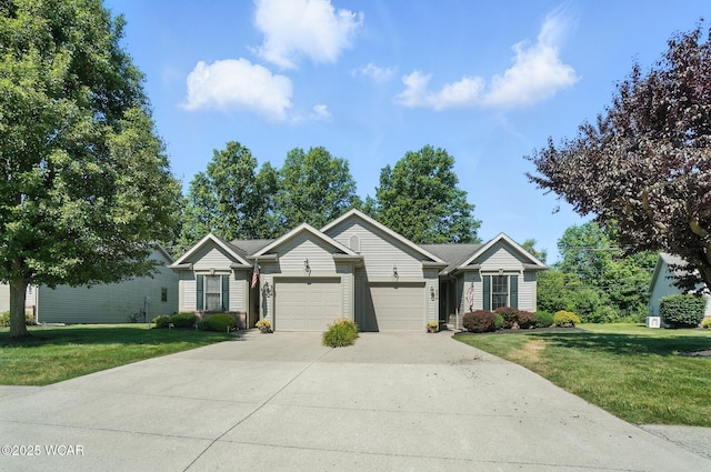 556 Westerly Dr, Lima, OH 45805 - ranch-style home with an attached garage, concrete driveway, and a front lawn