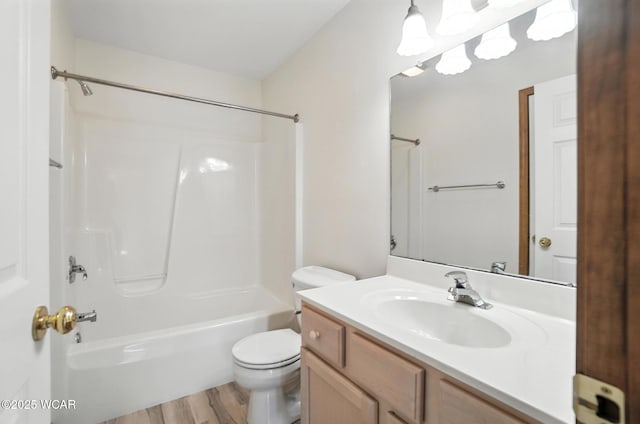 556 Westerly Dr, Lima, OH 45805 - bathroom with vanity, wood finished floors, and washtub / shower combination