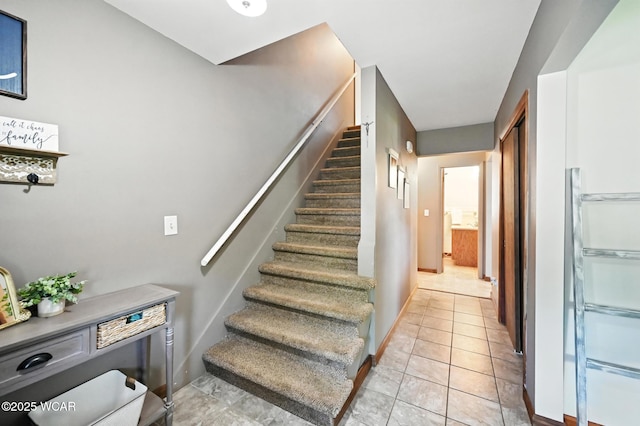1851 Wendell Ave, Lima, OH 45805 - staircase with tile patterned flooring and baseboards