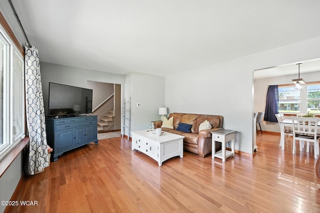1851 Wendell Ave, Lima, OH 45805 - living area with light wood finished floors and stairway