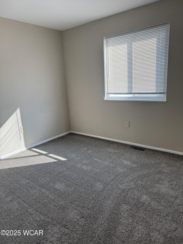 2275 N Cable Rd Unit 25, Lima, OH 45807 - carpeted spare room with baseboards