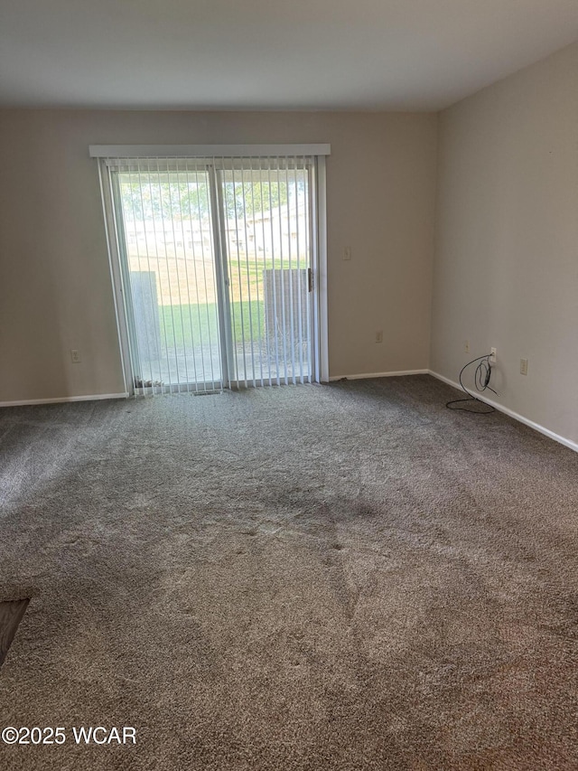 2275 N Cable Rd Unit 25, Lima, OH 45807 - carpeted spare room with baseboards