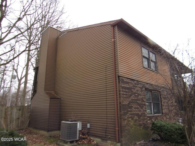 view of home's exterior featuring cooling unit