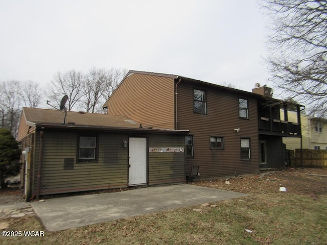 back of property featuring a patio area