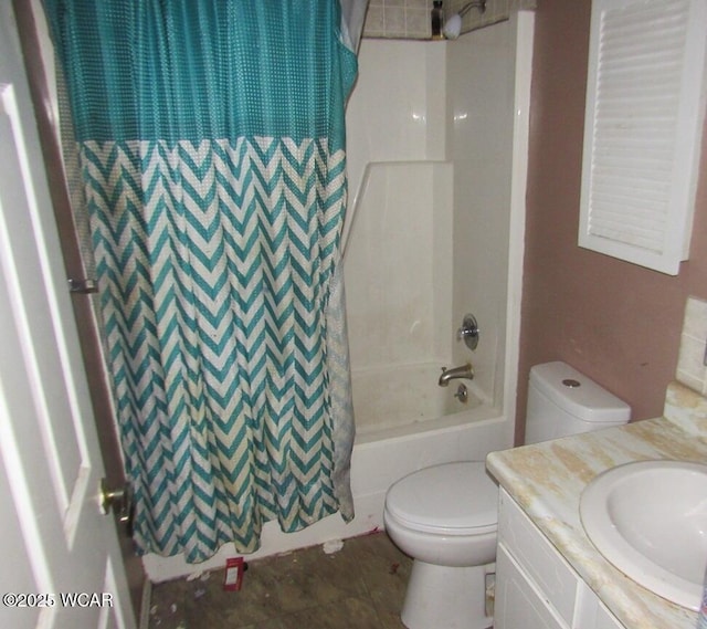 full bathroom featuring vanity, shower / bathtub combination with curtain, and toilet