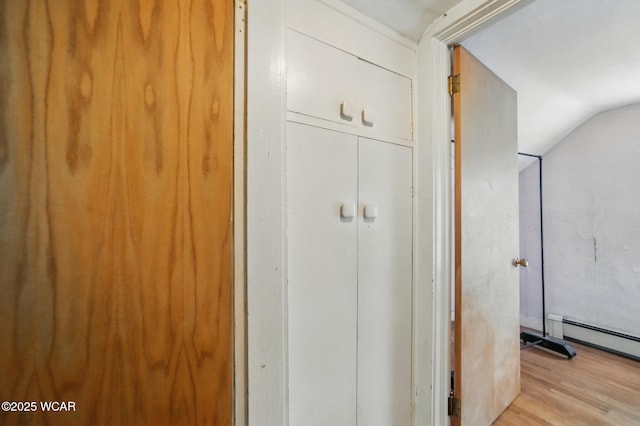 411 W Pattison Ave, Kenton, OH 43326 - detailed view of wood finished floors and a baseboard heating unit