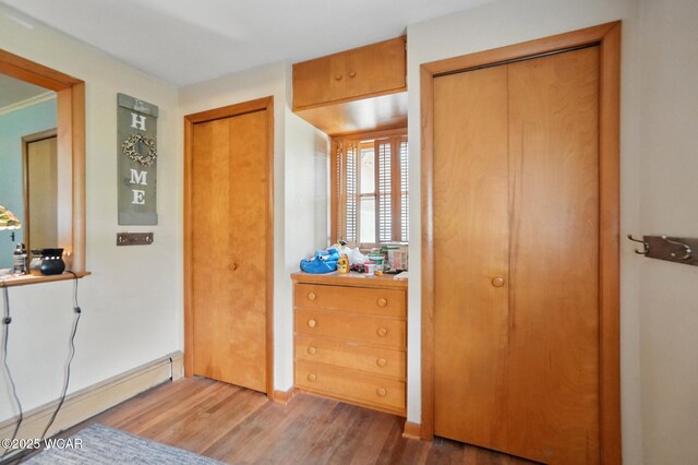 411 W Pattison Ave, Kenton, OH 43326 - entryway with wood finished floors, baseboard heating, and baseboards
