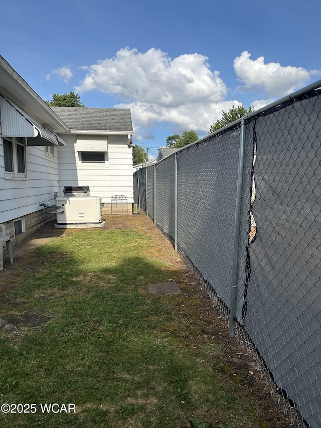 view of yard with fence