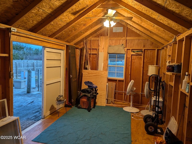 interior space with visible vents and a ceiling fan