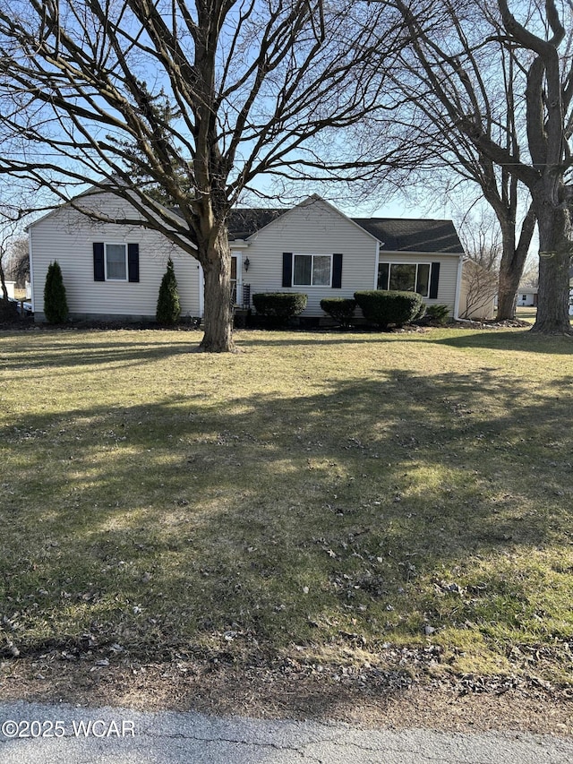 ranch-style house with a front lawn