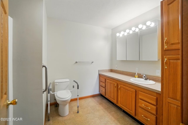 1330 Christina St, Delphos, OH 45833 - bathroom featuring toilet, vanity, and tile patterned floors
