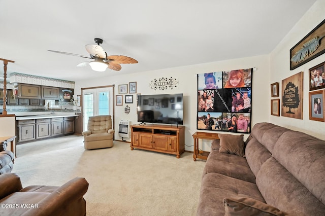 10815 Holdgreve Rd, Delphos, OH 45833 - living room featuring heating unit, ceiling fan, and light colored carpet