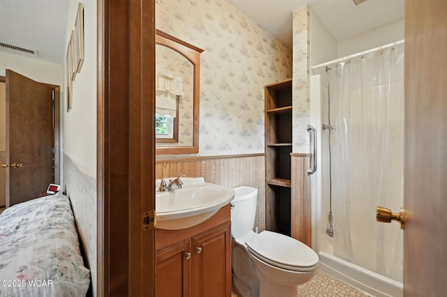 10815 Holdgreve Rd, Delphos, OH 45833 - full bathroom with wallpapered walls, a wainscoted wall, vanity, and a shower with curtain