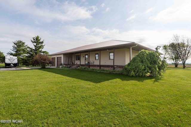 14351 Rd 19, Fort Jennings, OH 45844 - view of front of home with a front yard, an attached garage, and a porch