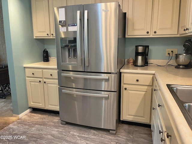 3031 Yoakam Rd, Lima, OH 45806 - kitchen featuring stainless steel fridge and light countertops