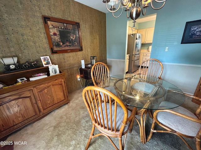 3031 Yoakam Rd, Lima, OH 45806 - dining area featuring a chandelier and light carpet