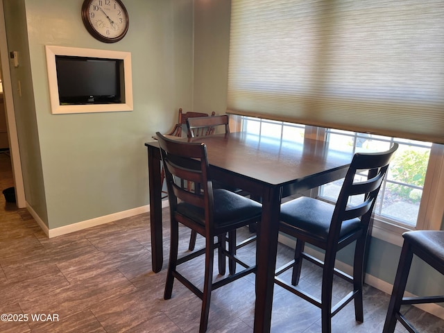 3031 Yoakam Rd, Lima, OH 45806 - dining area featuring baseboards and wood finished floors