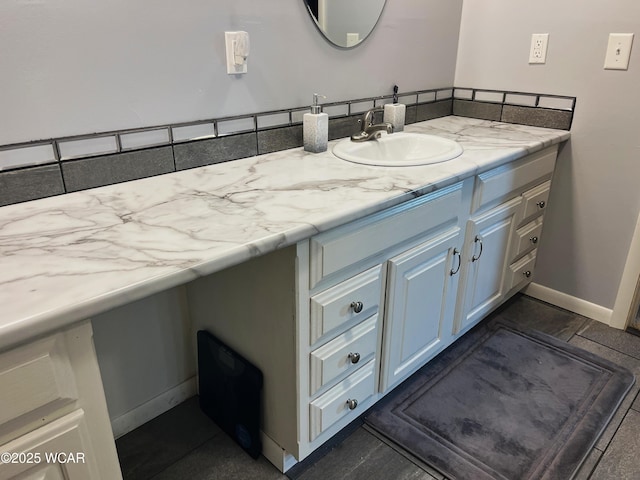 3031 Yoakam Rd, Lima, OH 45806 - bathroom featuring vanity and baseboards