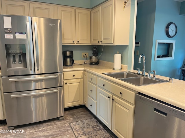 3031 Yoakam Rd, Lima, OH 45806 - kitchen with appliances with stainless steel finishes and light countertops