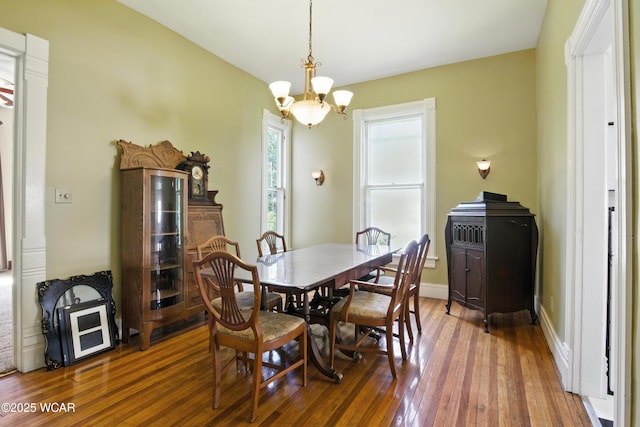 302 N Market St, Van Wert, OH 45891 - dining space with a chandelier and hardwood / wood-style floors
