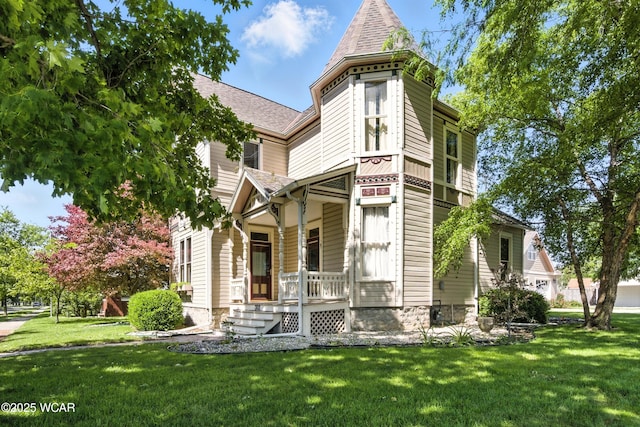 302 N Market St, Van Wert, OH 45891 - victorian-style house featuring a porch, a front lawn, and a shingled roof