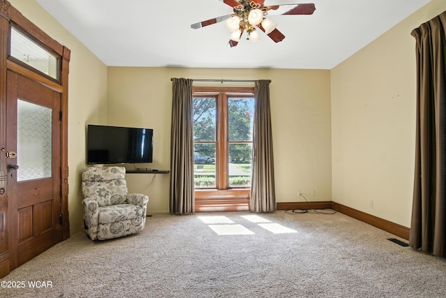 302 N Market St, Van Wert, OH 45891 - living area featuring carpet floors and ceiling fan