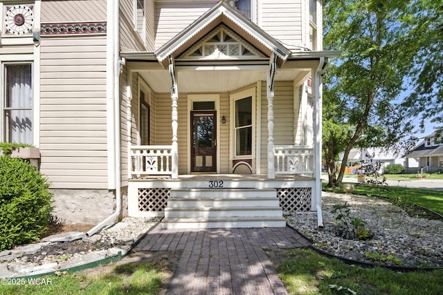 302 N Market St, Van Wert, OH 45891 - doorway to property featuring a porch