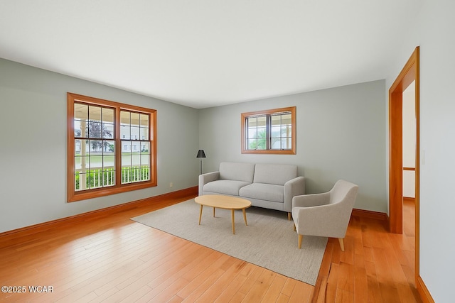 4860 Wenatchi Trl, Lima, OH 45805 - living area featuring light wood-style flooring and baseboards