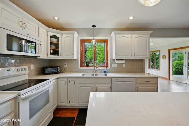 4860 Wenatchi Trl, Lima, OH 45805 - kitchen featuring white appliances, healthy amount of natural light, dark wood-style floors, and recessed lighting
