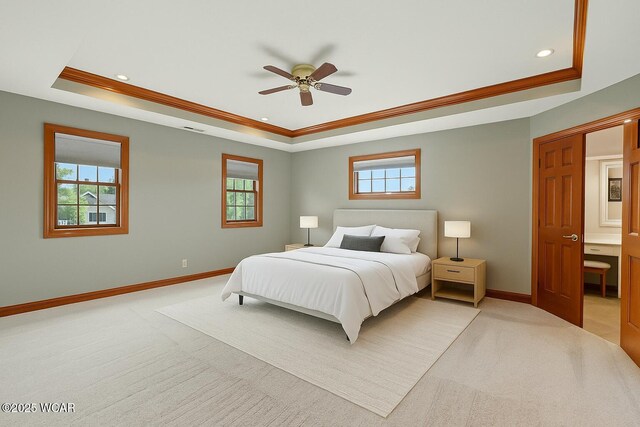 4860 Wenatchi Trl, Lima, OH 45805 - bedroom featuring a tray ceiling, light carpet, ornamental molding, recessed lighting, and a ceiling fan