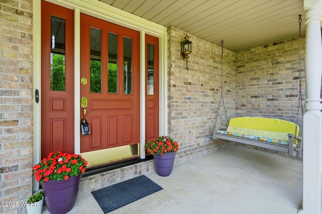 4860 Wenatchi Trl, Lima, OH 45805 - property entrance with brick siding and a porch
