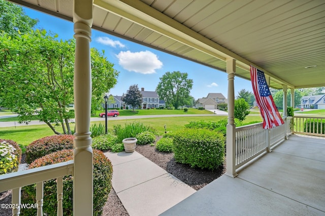 4860 Wenatchi Trl, Lima, OH 45805 - porch with a residential view and a lawn