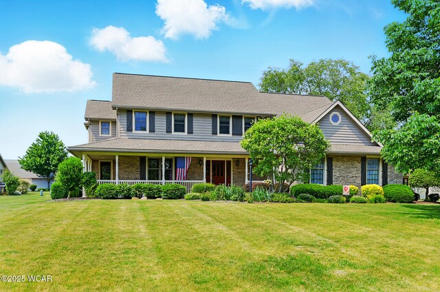 4860 Wenatchi Trl, Lima, OH 45805 - view of front of home featuring a front yard and covered porch