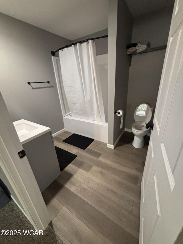 1012 Sherman Ave, Lima, OH 45801 - full bath featuring wood finished floors, shower / tub combo with curtain, and vanity