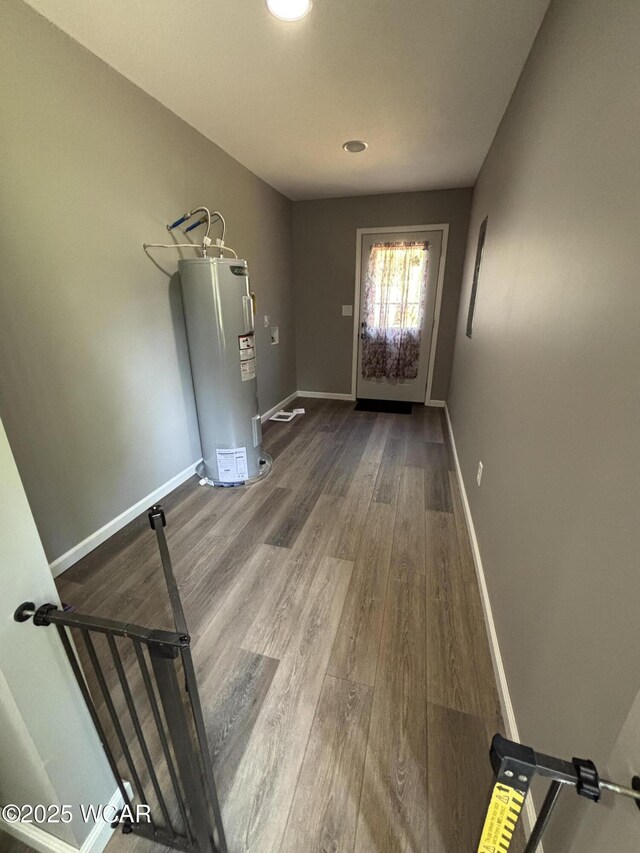 1012 Sherman Ave, Lima, OH 45801 - entryway featuring electric water heater, wood finished floors, and recessed lighting