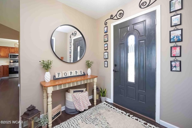 16070 Rd S, Columbus Grove, OH 45830 - entrance foyer featuring baseboards and dark wood finished floors