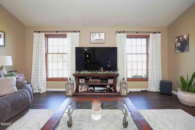 16070 Rd S, Columbus Grove, OH 45830 - living area with baseboards, wood finished floors, and healthy amount of natural light