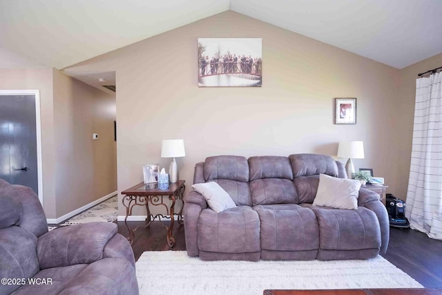 16070 Rd S, Columbus Grove, OH 45830 - living room with wood finished floors, lofted ceiling, and baseboards