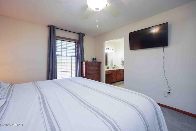 16070 Rd S, Columbus Grove, OH 45830 - bedroom with light colored carpet, baseboards, ensuite bathroom, ceiling fan, and a sink