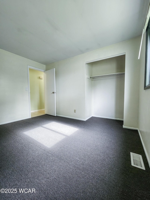 2028 Greendale Ave, Findlay, OH 45840 - unfurnished bedroom featuring carpet, baseboards, and a closet