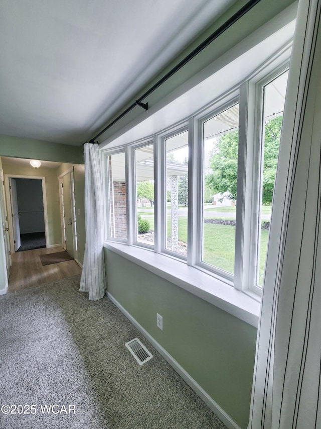 2028 Greendale Ave, Findlay, OH 45840 - empty room with healthy amount of natural light, baseboards, and carpet