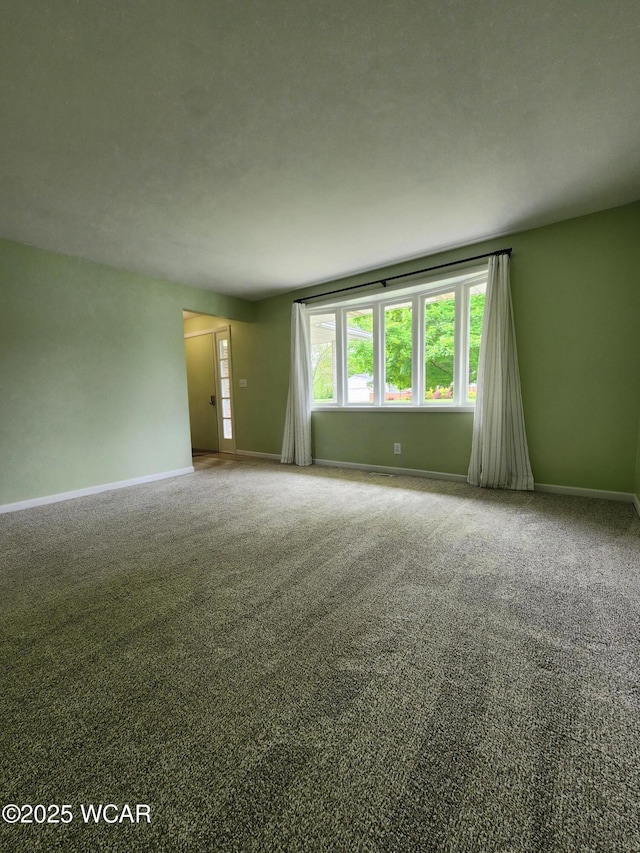 2028 Greendale Ave, Findlay, OH 45840 - unfurnished room with baseboards and carpet