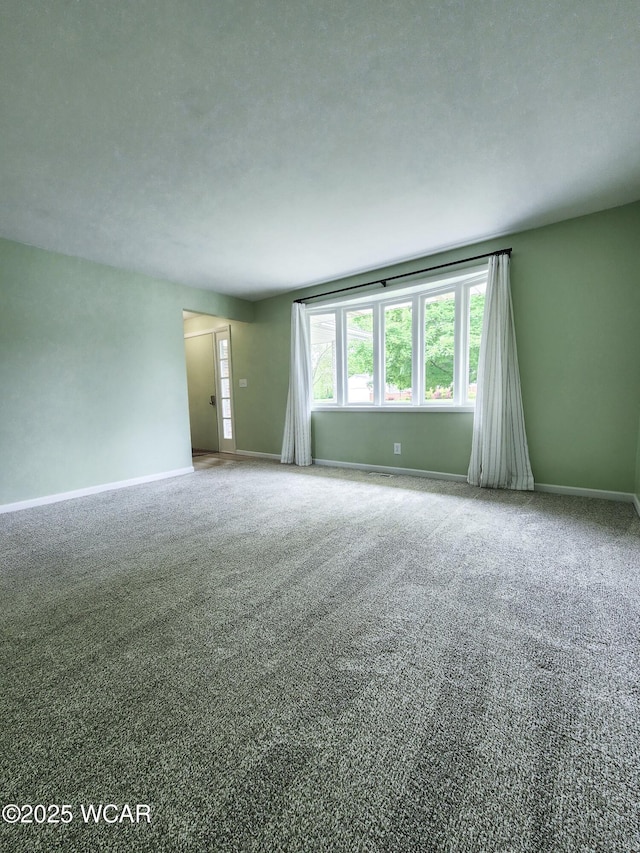 2028 Greendale Ave, Findlay, OH 45840 - carpeted spare room with baseboards