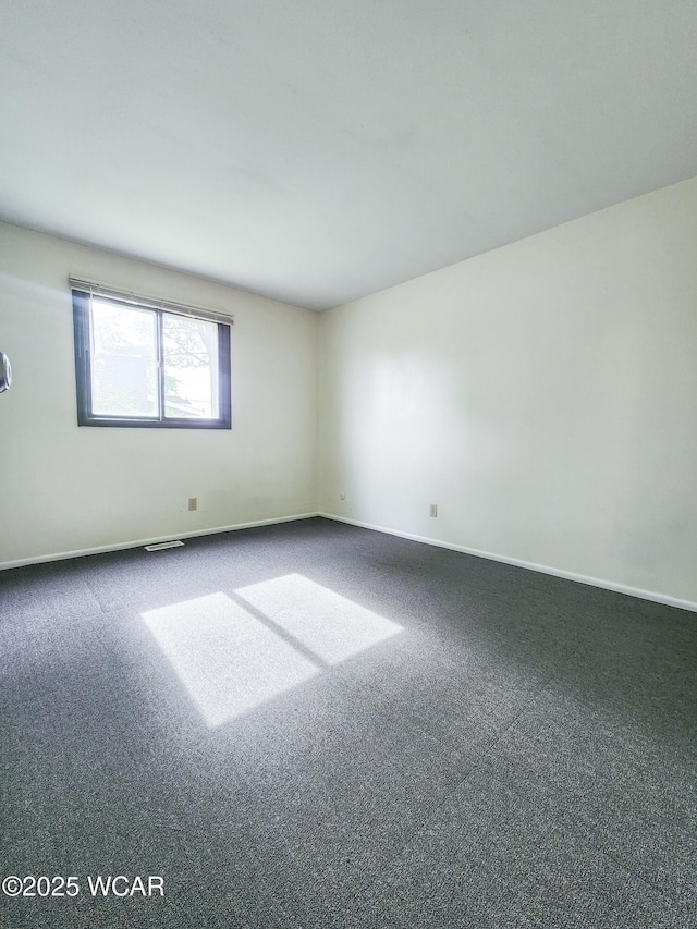 2028 Greendale Ave, Findlay, OH 45840 - spare room with carpet and baseboards