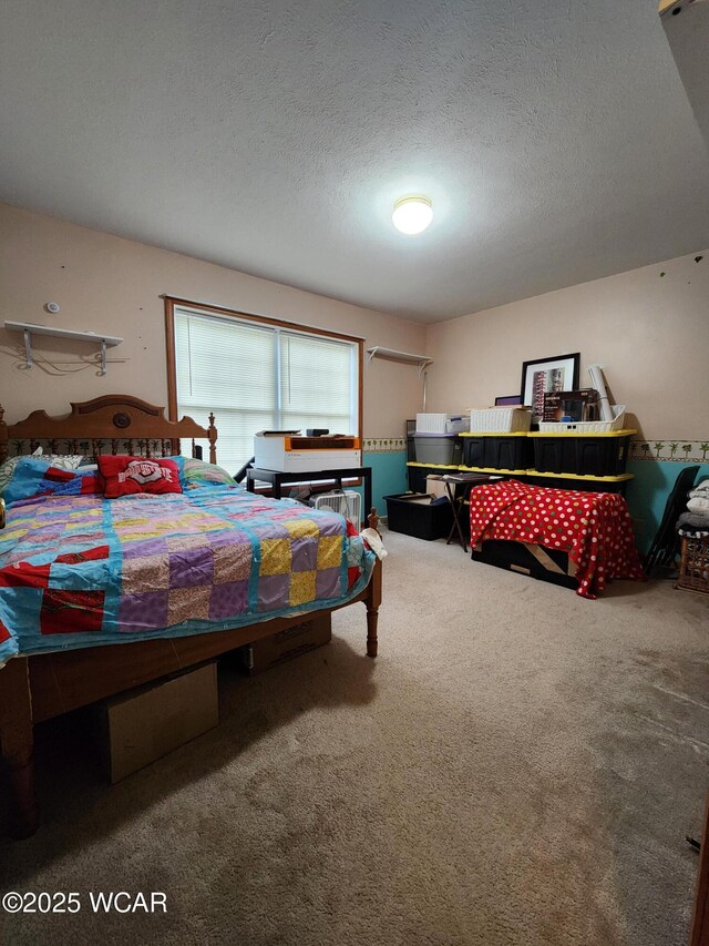 bedroom featuring a closet and light carpet