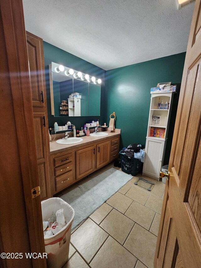 bathroom featuring a textured wall