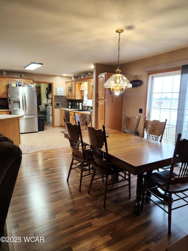 dining room featuring light wood finished floors